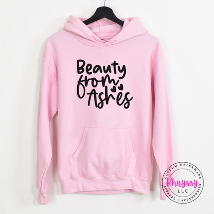 Light Pink hoodie with a soft black Beauty From Ashes message