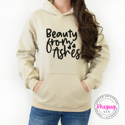 Sand hoodie showing a delicate Christian script graphic