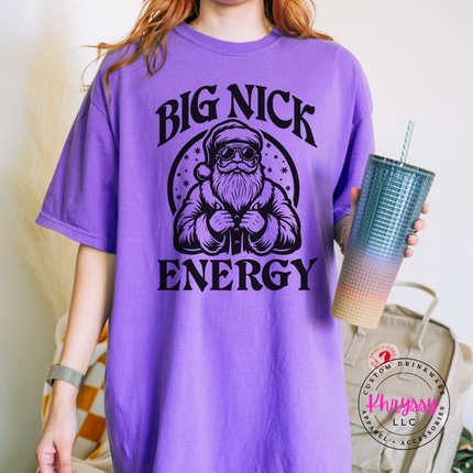 Violet tee showing a buff Santa in sunglasses and bold lettering.