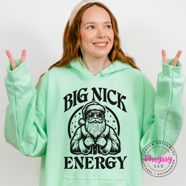 Flat lay of the Big Nick Energy Christmas hoodie in Mint Green.
