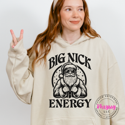 Model wearing the Big Nick Energy hoodie in Sand.