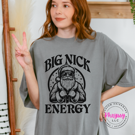 Flat lay of the Big Nick Energy Christmas tee in Gray.