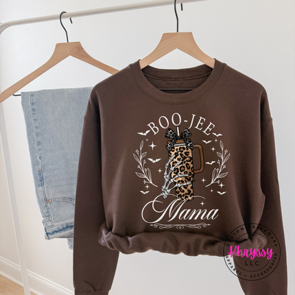 Dark chocolate crewneck sweatshirt with a boo-jee mama skeleton illustration.