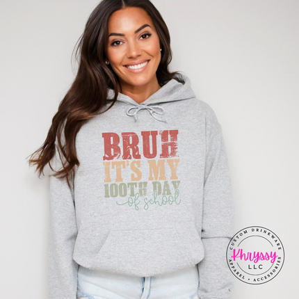 Ash grey pullover hoodie with a distressed 100th day of school print.