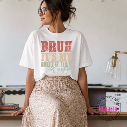 white tee with an earthy retro 100th day celebration design.