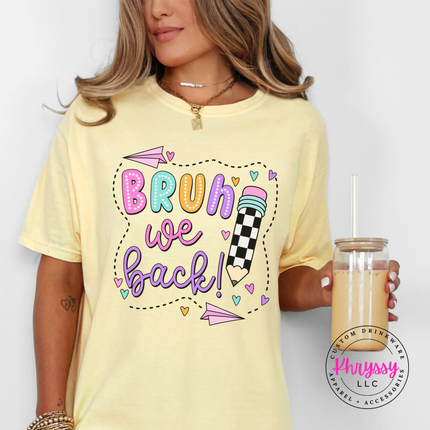 Butter yellow back-to-school tee with a checkered pencil and doodled hearts.