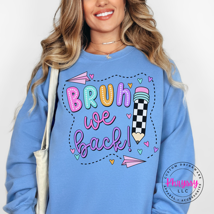 Carolina blue crewneck featuring a checkered pencil and back-to-school lettering.