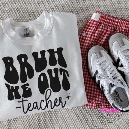 White crewneck sweatshirt worn outdoors, highlighting the playful teacher quote.