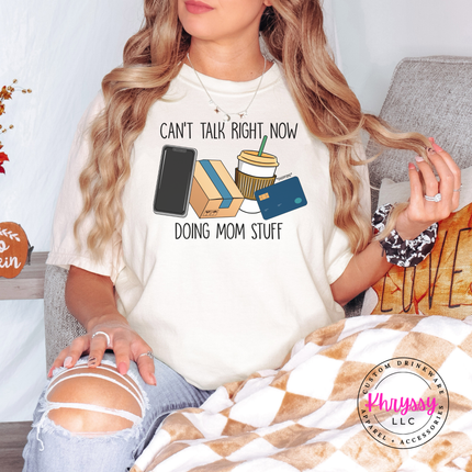 Ivory tee featuring the busy mom life design with iced coffee and phone