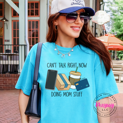 Folded Lagoon tee printed with the funny doing mom stuff design
