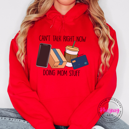 Red hoodie with the can't talk right now mom stuff design