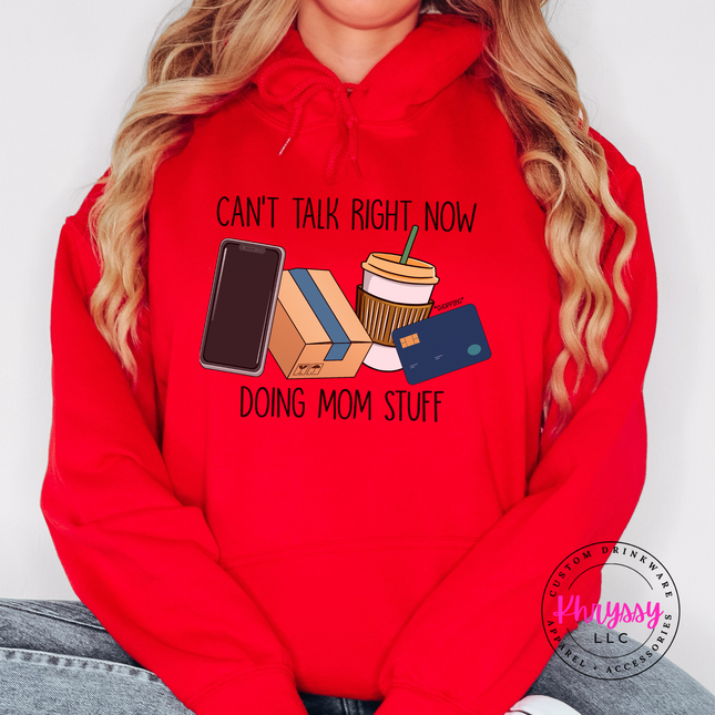 Red hoodie with the can't talk right now mom stuff design