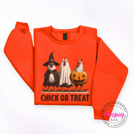Orange green Halloween chicken crewneck styled with jeans for fall.