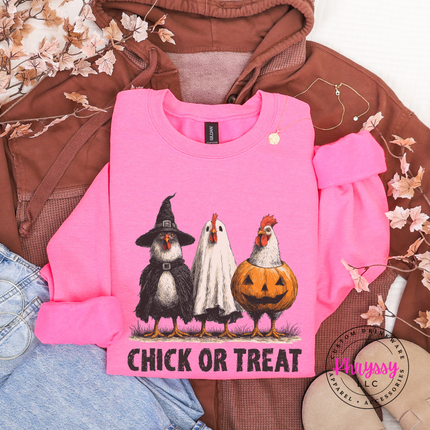 Safety Pink crewneck sweatshirt with the Chick or Treat Halloween chicken graphic