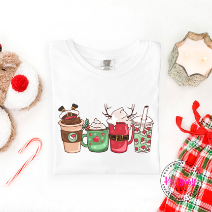 Close up of the Christmas coffee cups print on a White tee.
