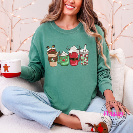 Light Green long sleeve tee with four festive Christmas coffee cups and lattes.