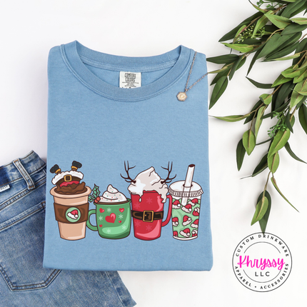 Holiday latte, cocoa mug and iced cup design on an Ice Blue long sleeve tee.
