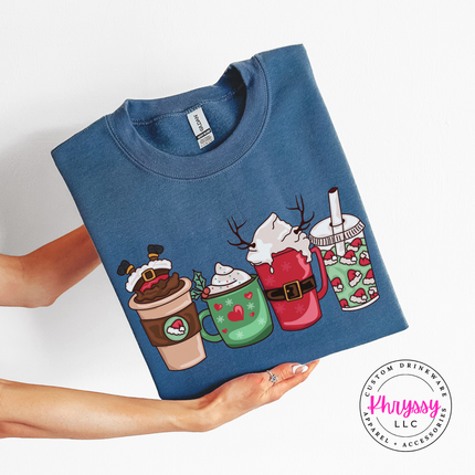Woman wearing the Christmas coffee cups crewneck sweatshirt in Indigo Blue.