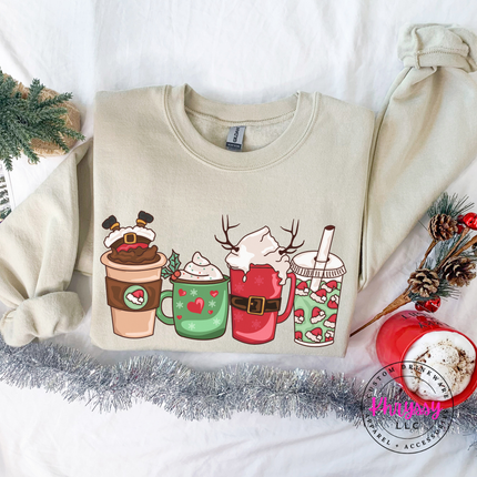 Woman wearing the Christmas coffee cups crewneck sweatshirt in Sand.