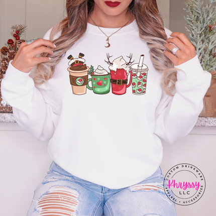Close up of the Christmas coffee cups print on a White crewneck sweatshirt.