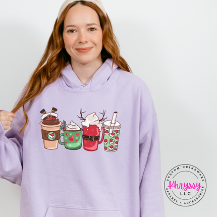 Close up of the Christmas coffee cups print on an Orchid hoodie.
