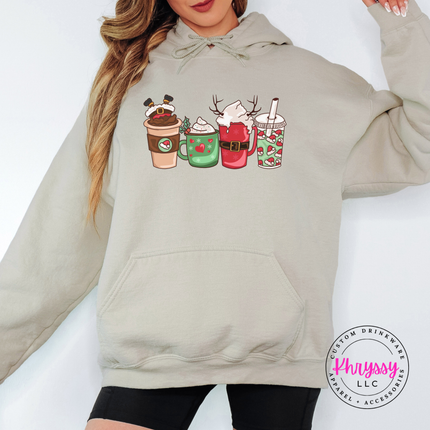 Holiday latte, cocoa mug and iced cup design on a Sand hoodie.