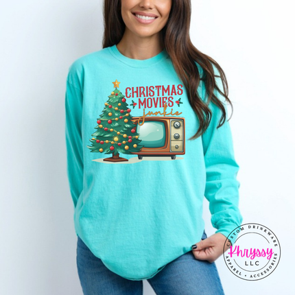 Close up of the Christmas movie junkie art on a Chalky Mint long sleeve tee.