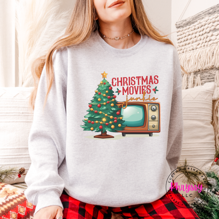 Ash crewneck sweatshirt featuring a retro TV and movie junkie lettering.