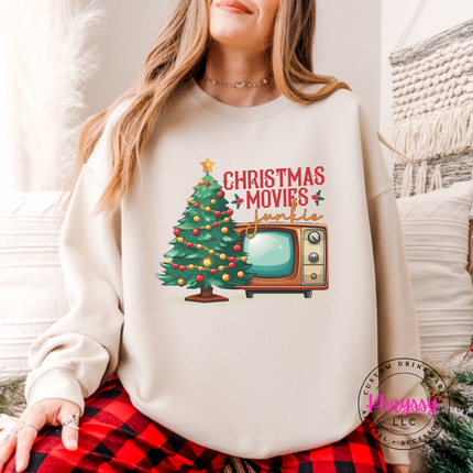 Sand crewneck sweatshirt featuring a retro TV and movie junkie lettering.