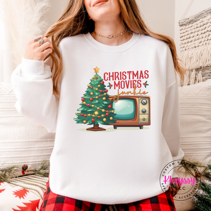 White crewneck sweatshirt showing a retro TV beside a decorated tree.