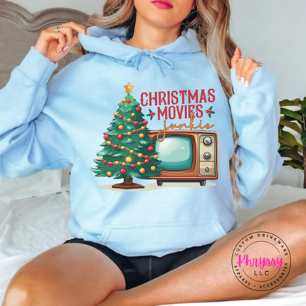 Light Blue hoodie showing a retro TV beside a decorated tree.