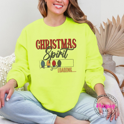 Model wearing the Christmas Spirit Loading crewneck sweatshirt in Safety Green.