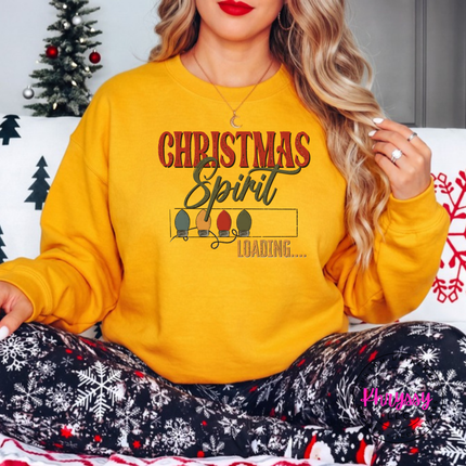Close up of the Christmas Spirit Loading art on a Gold crewneck sweatshirt.