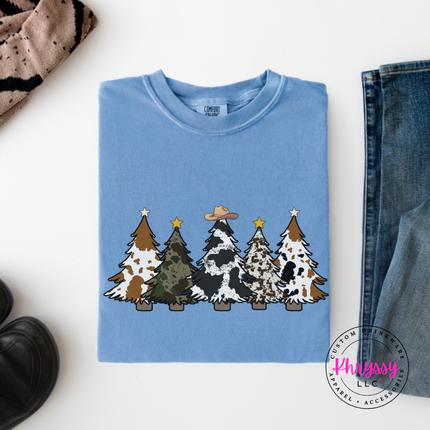 Washed Denim long sleeve tee showing patterned Christmas trees with a cowboy hat.