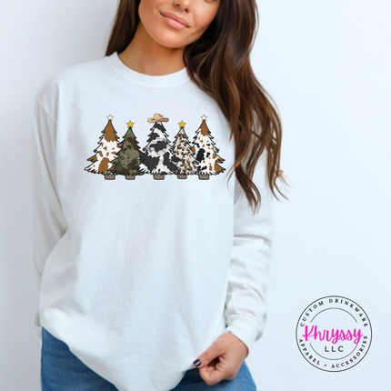 Flat lay of the cow print trees Christmas long sleeve tee in White.