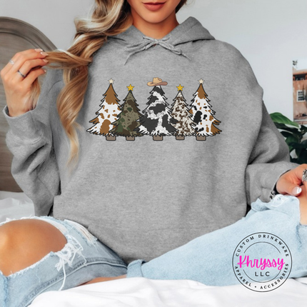 Sport Gray hoodie showing patterned Christmas trees with a cowboy hat.