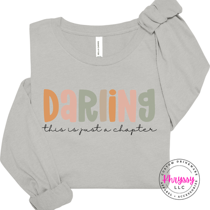 Silver long sleeve tee showing a gentle pastel hope and encouragement design