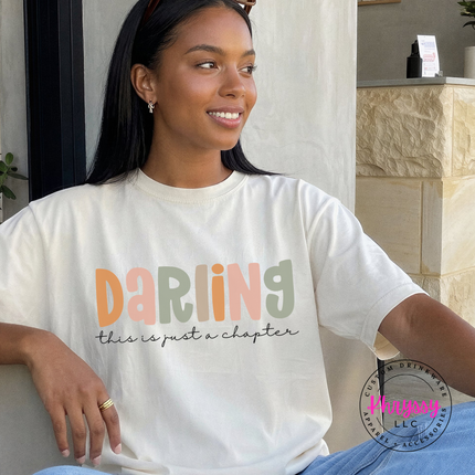 Ivory tee with multicolor Darling lettering and black cursive subtext