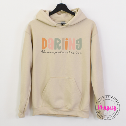 Sand hoodie showing a gentle pastel hope and encouragement design