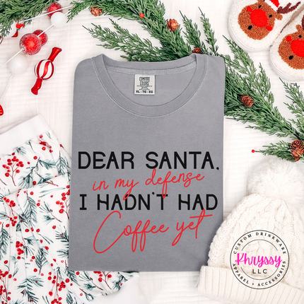 Close up of the Dear Santa coffee quote on a Gray tee