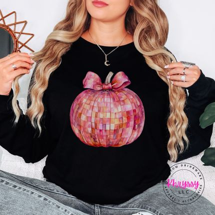 Black long sleeve tee with the coquette disco pumpkin fall print