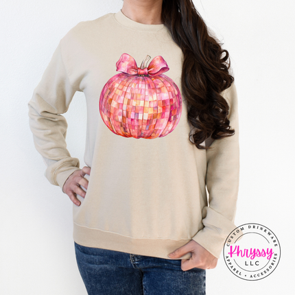 Sand colored crewneck sweatshirt with a glam pink pumpkin design.