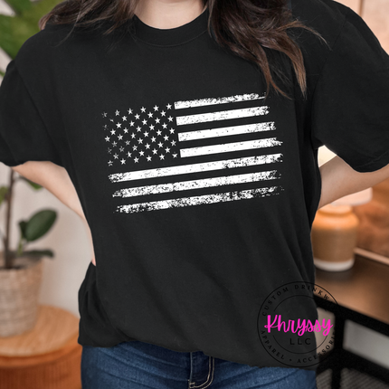Black garment-dyed tee with a white distressed American flag graphic on the chest.