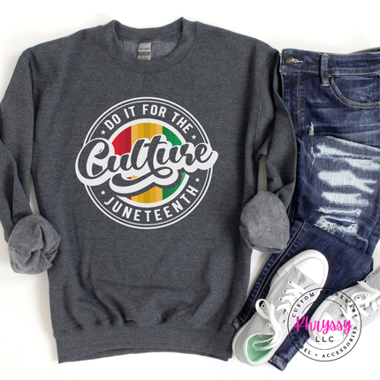 Dark heather crewneck sweatshirt showing a white retro Juneteenth culture design.
