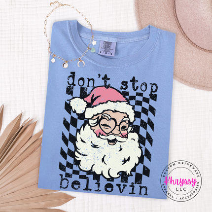 Washed Denim long sleeve tee showing a retro Santa with typewriter lettering.