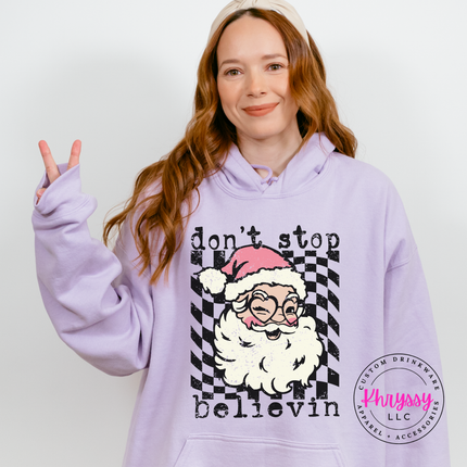 Orchid hoodie featuring a winking Santa over a checkered circle.