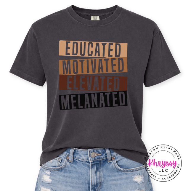 Graphite Comfort Colors tee printed with bold gold brown and black Educated Motivated Elevated Melanated design.