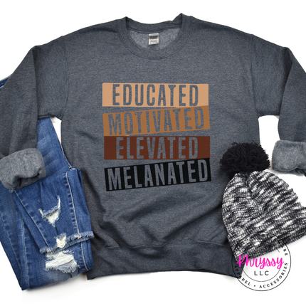 Dark Heather Gildan crewneck printed with bold gold brown and black Educated Motivated Elevated Melanated design.