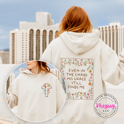 Woman wearing a sand Christian floral cross statement tee