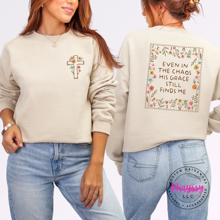 Woman wearing a pink Christian floral cross statement tee